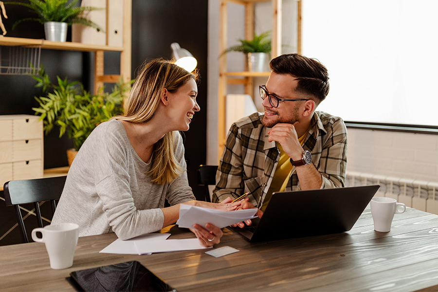 Vocal_Credit_Union-Banking_Services_Helena Couple planning future expenses with Vocal Services